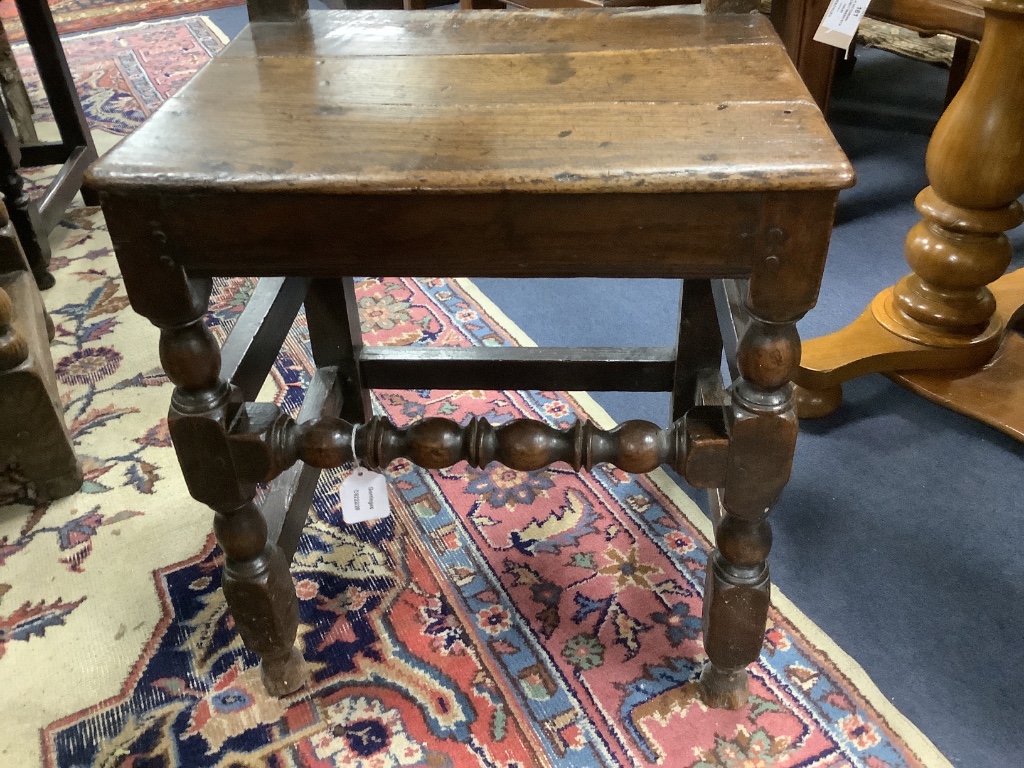 A 17th century oak back stool with lozenge carved decoration, width 47cm, depth 39cm, height 98cm